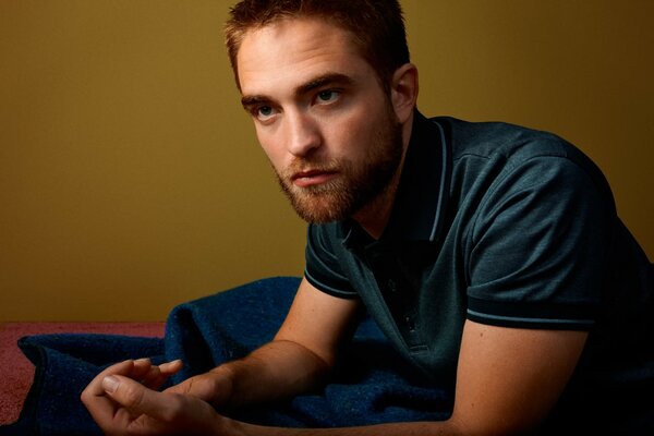 Robert pattinson in a studio photo shoot