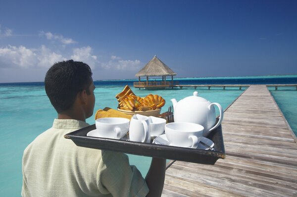 A tray with dishes on the ocean