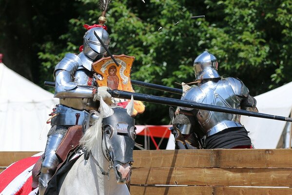 Knight s tournament on horses in armor