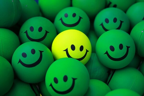 Uśmiechnięte zielone kulki, emotikony