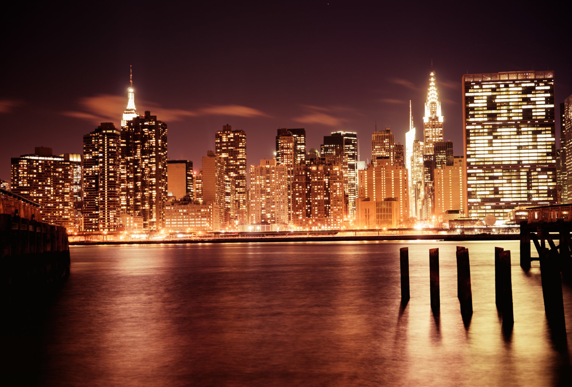 new york manhattan usa skyscrapers chrysler building empire state building empire state building city evening lights skyscrapers buildings houses river light