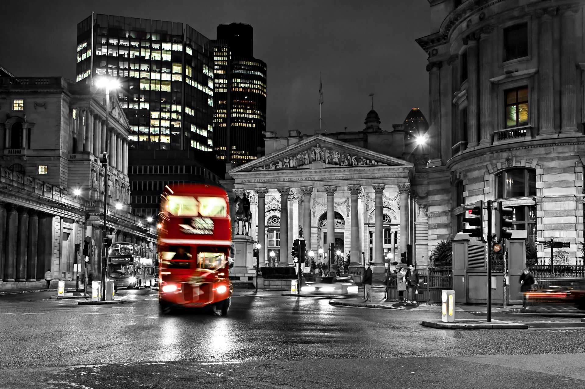 london england bus night lights blur street road city black and white town building