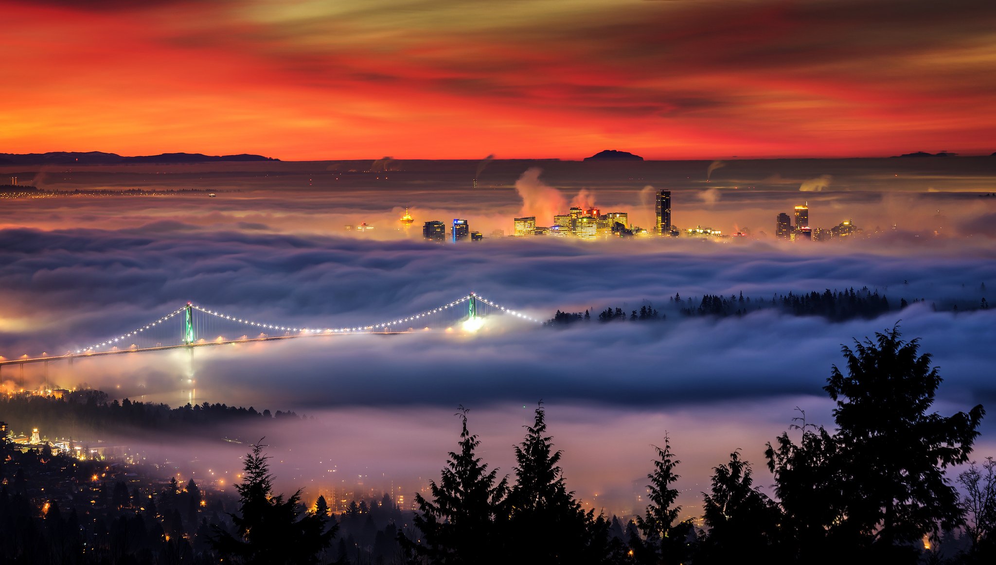 kanada kolumbia brytyjska vancouver zima rano domy światła most mgła alexis birkill fotografia