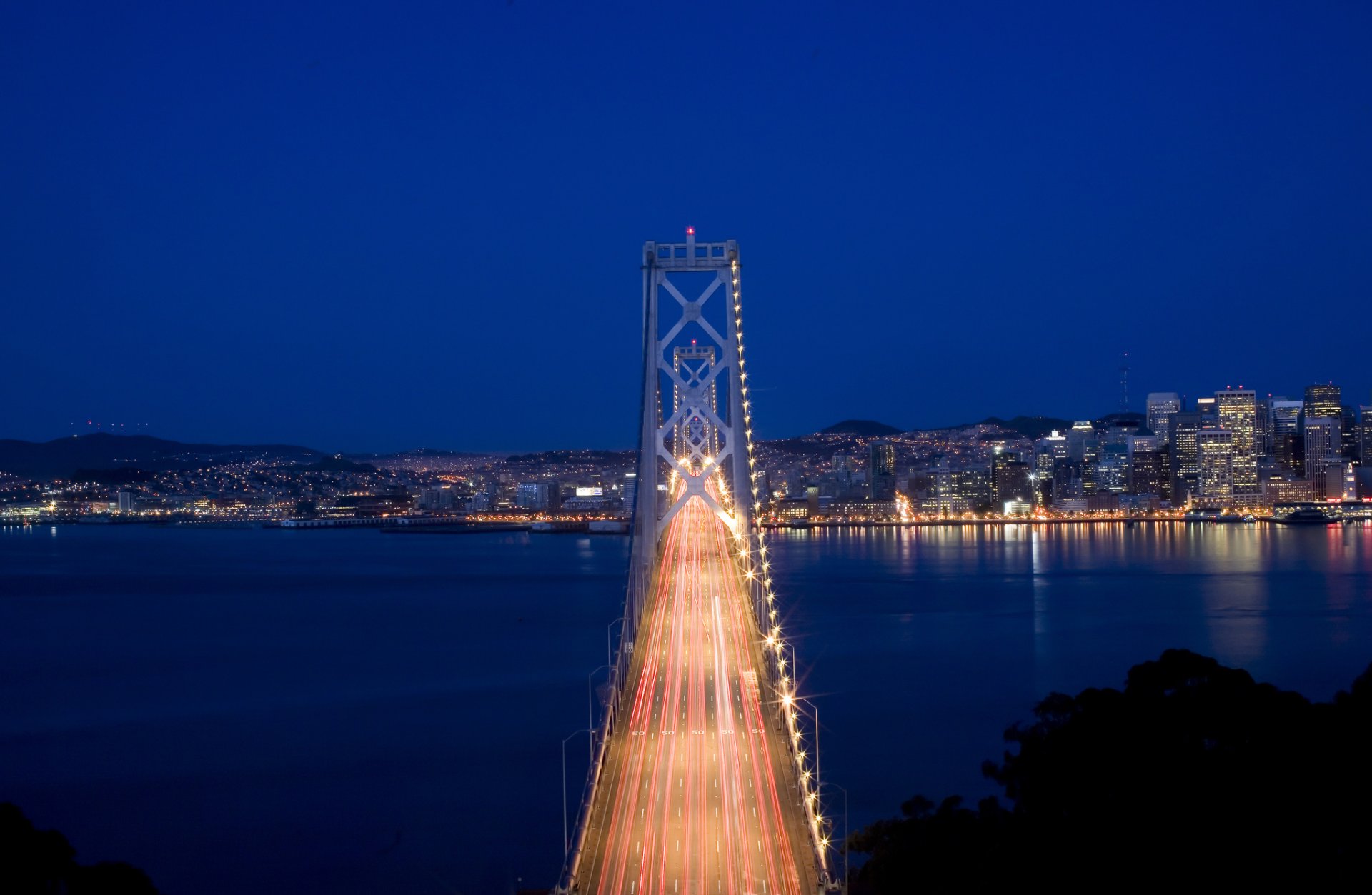 united states california san francisco town lights lighting night blue sky bridge motion traffic extract strait