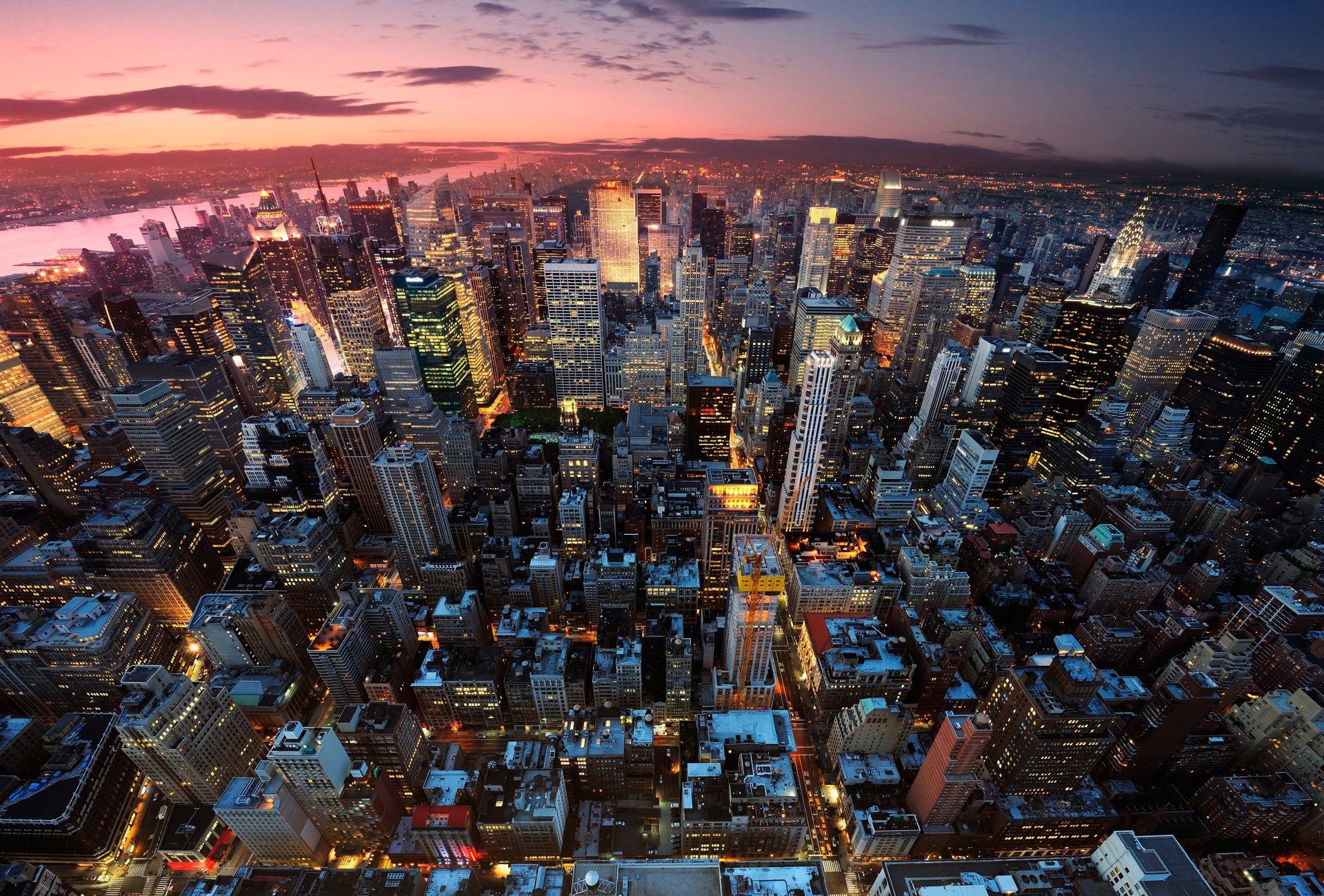 new york manhattan usa stadt panorama abend sonnenuntergang lichter licht häuser gebäude hochhäuser wolkenkratzer