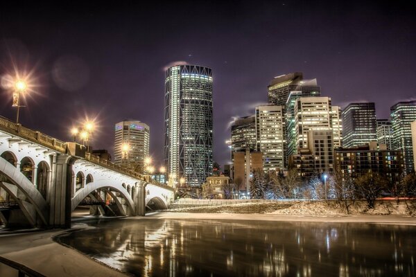 The light of the night city reflected in the river