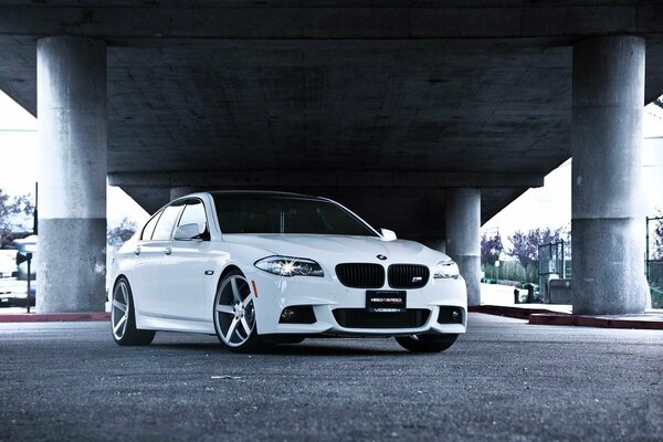 White BMW on a gray background