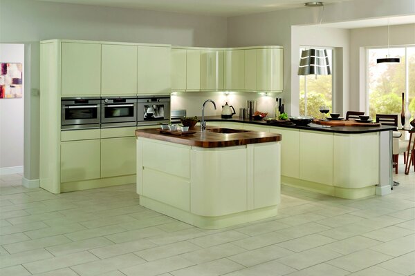 Light green kitchen with kitchen island