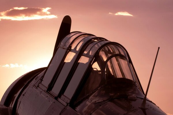 Cabine d avion sur fond de coucher de soleil