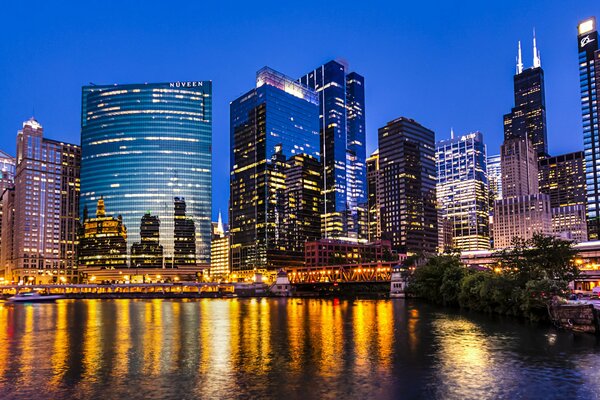 The lights of Chicago skyscrapers, reflected in the water , in Illinois USA