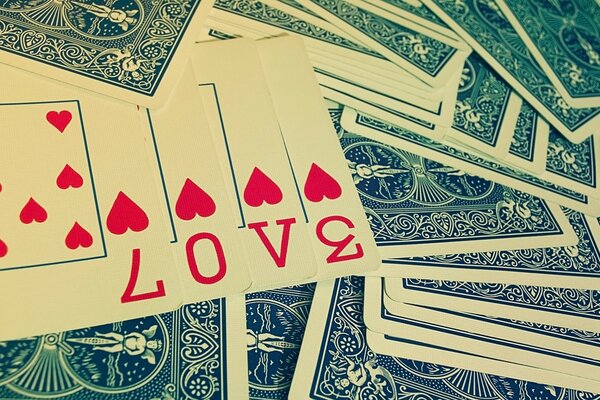 The cards show the word love