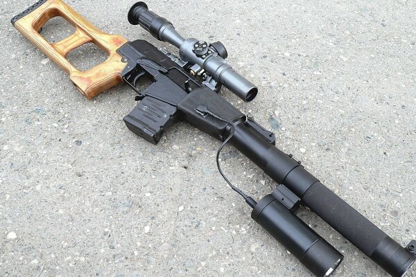 Sniper rifle lying on the ground