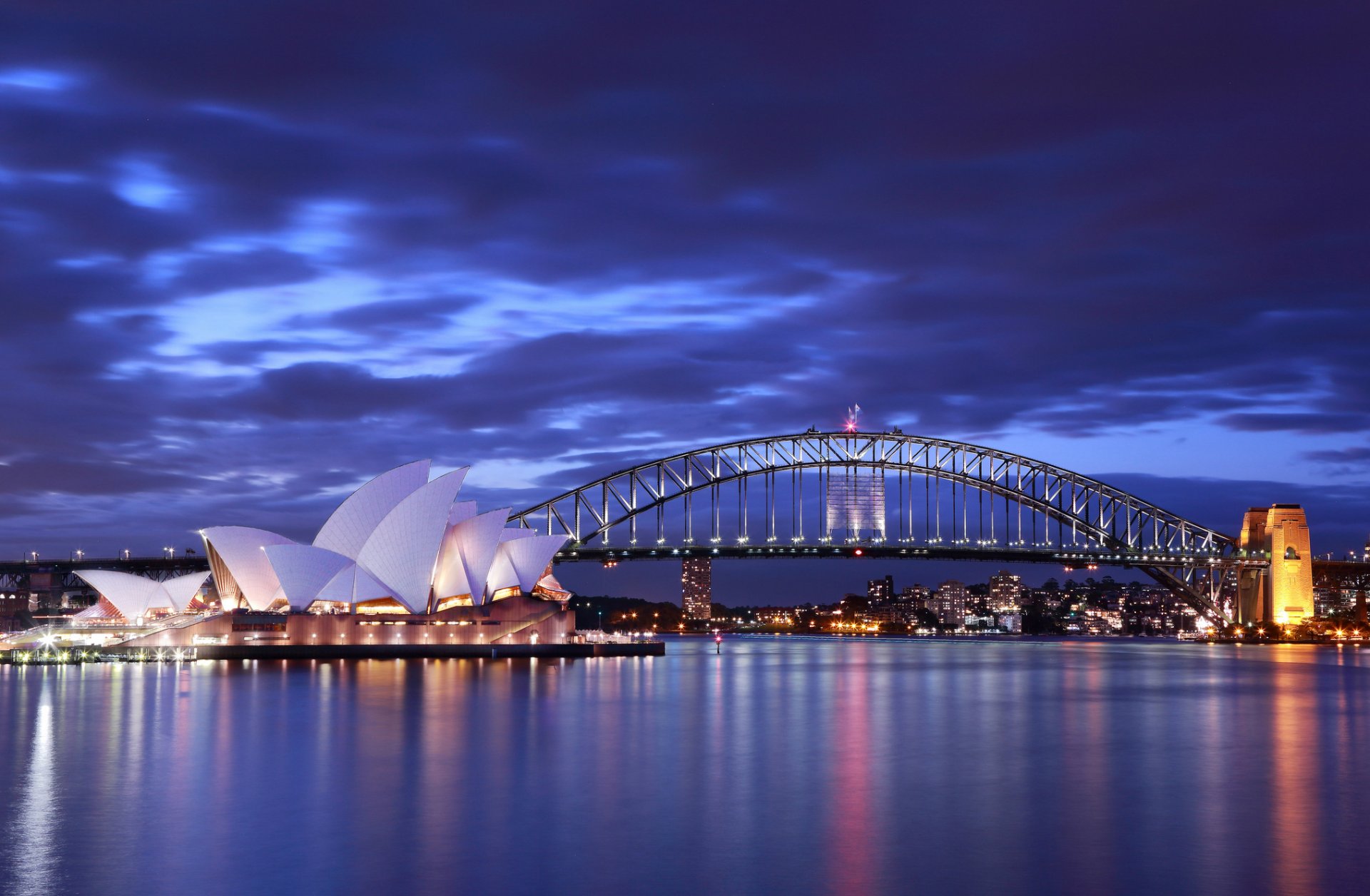 australia sydney opera house bridge night lights lighting blue sky clouds gulf sea