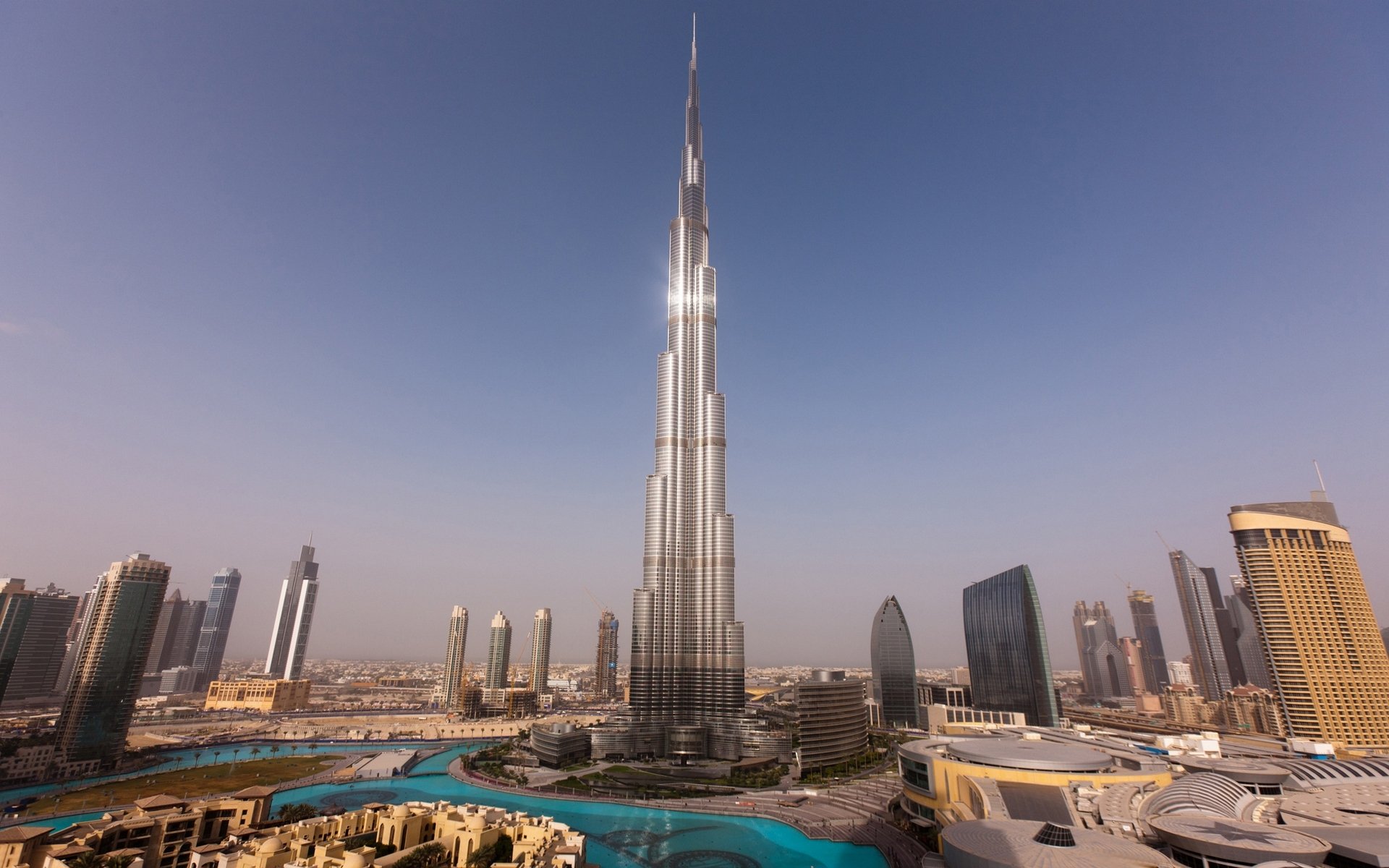 dubai rascacielos torres casas burj khalifa puesta de sol agua cielo