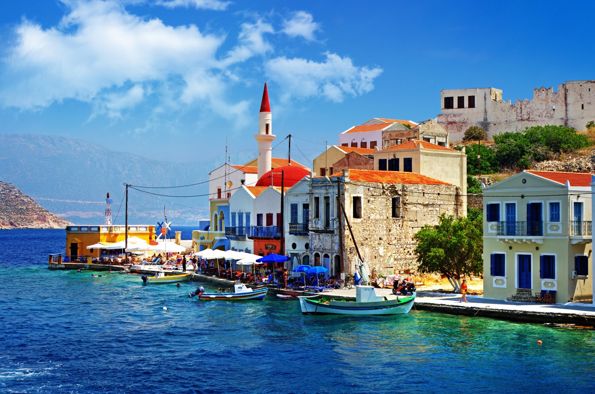 greece embankment pier boat sea people house the old slope tree