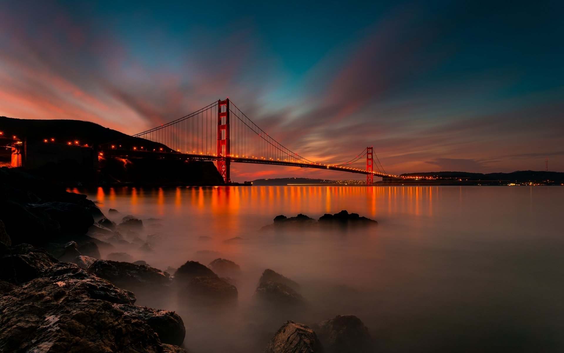 san francisco kalifornien usa golden gate bridge golden gate bridge brücke licht abend sonnenuntergang stadt meerenge steine