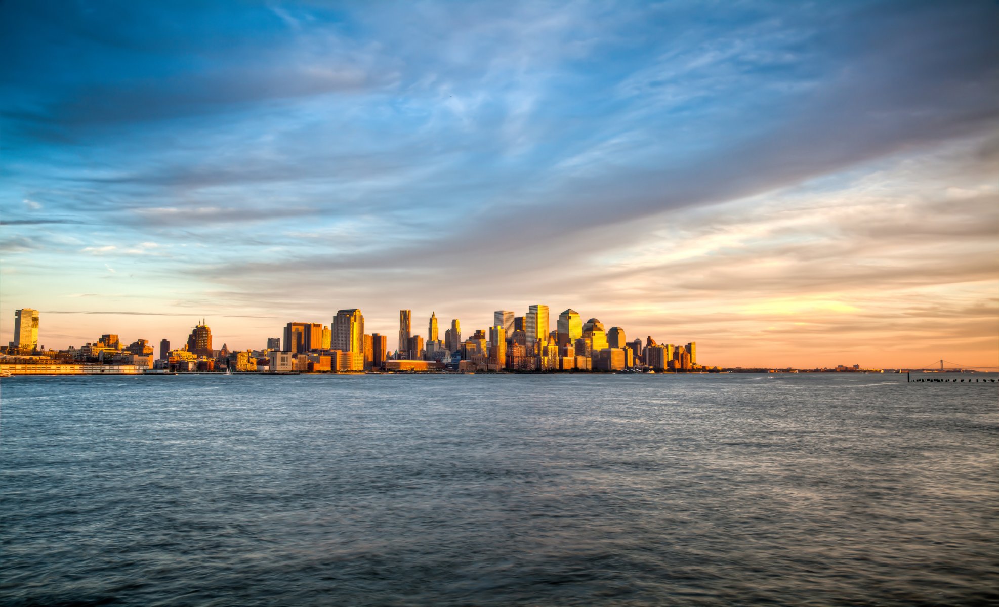 new york manhattan île mer vagues eau paysage vue vue d ensemble ciel soir coucher de soleil nuages