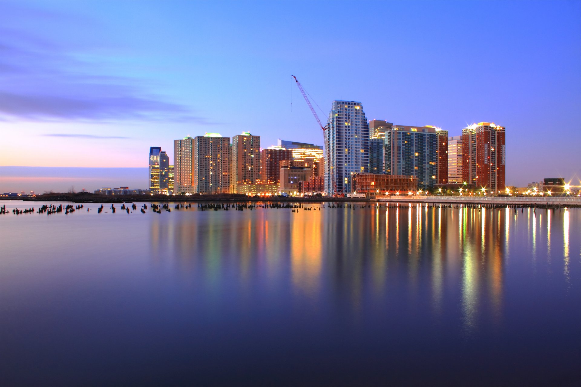 estados unidos jersey city nueva jersey nueva jersey puerto lila noche rosa puesta de sol cielo nubes rascacielos luz luces río hudson reflexión