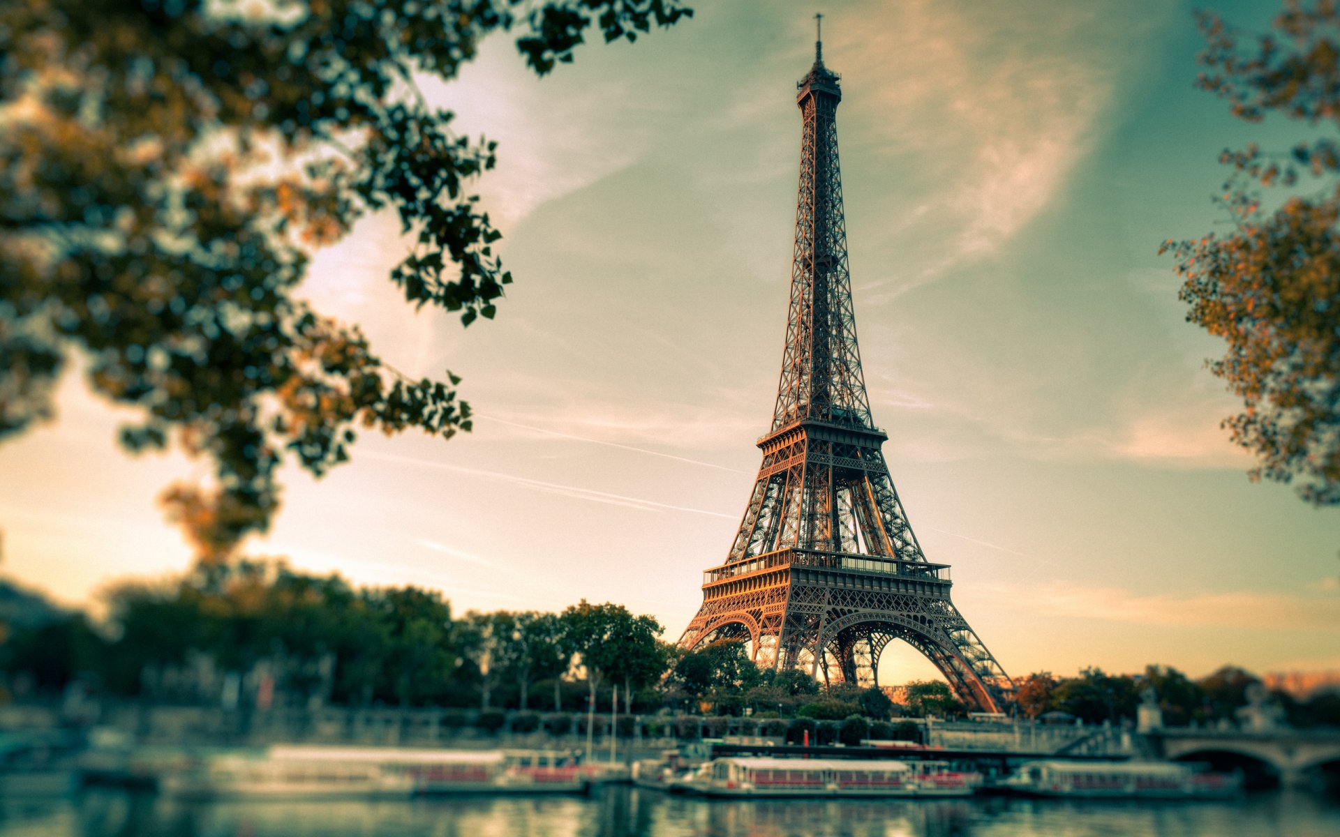 paris eiffel tower. sunset town. river