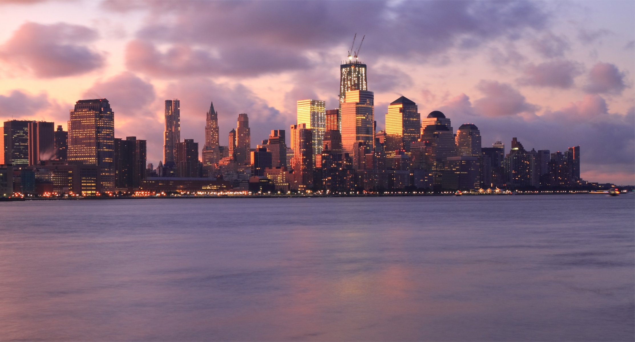 usa new york united states metropolis buildings skyscraper light lights river night pink sunset sky cloud