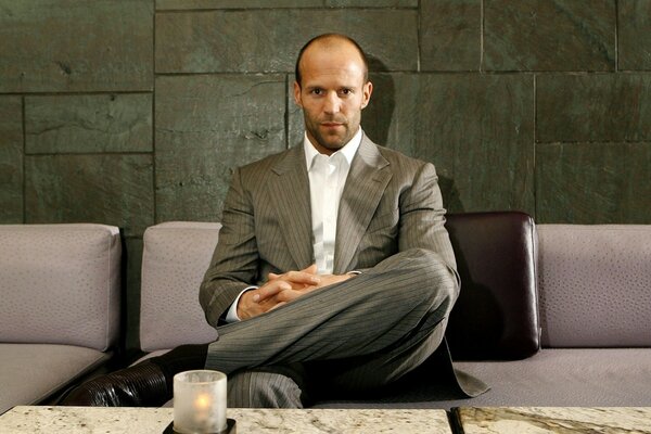 Elegant Jason Statham on the couch