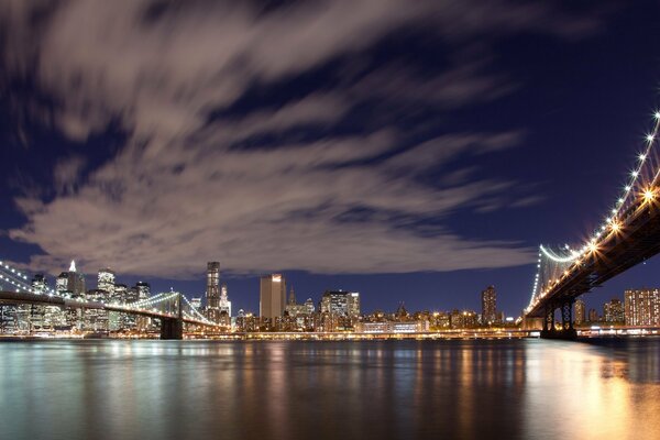 Brooklyn Bridge on the background of the city