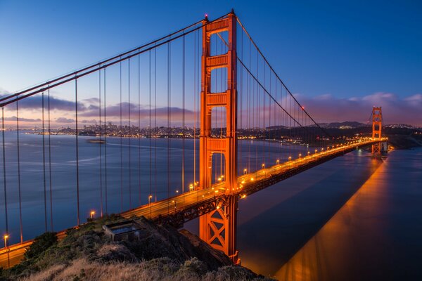 Golden Gate Bridge in evening lights