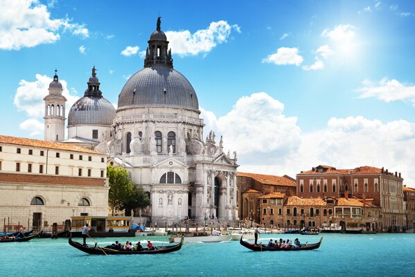 An ancient city on the water against a blue sky