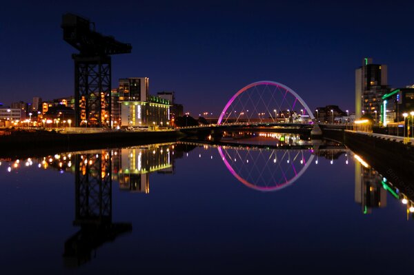 Lights of the evening University on the riverbank in the UK