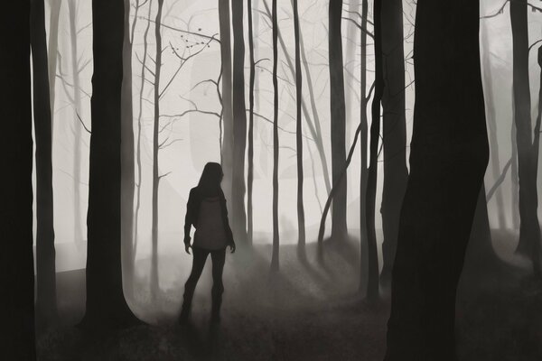 Silueta de una chica en el bosque oscuro