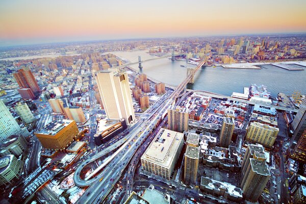 Bridge skyscrapers Roads Cars Winter day