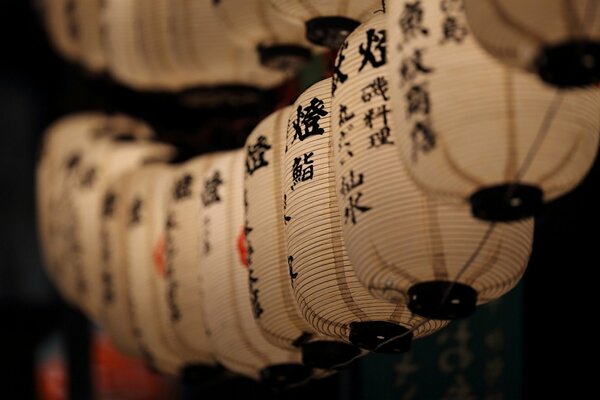 Chinese white lanterns with hieroglyphs