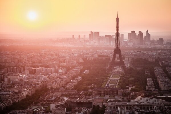 In the morning, the Eiffel Tower in the city of Paris is simply magnificent in the fog