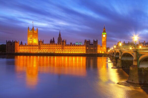 Illuminated by the golden light of the Thames lanterns