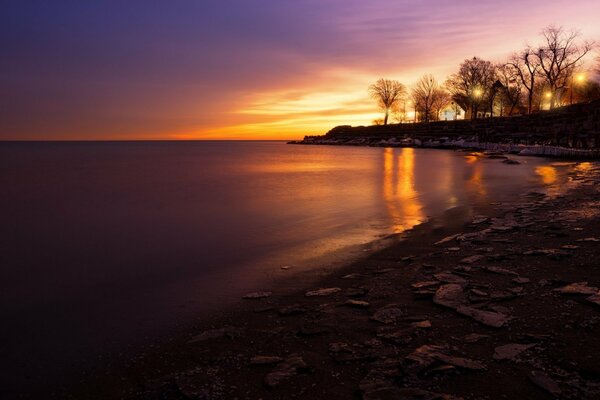 Beautiful sunset on the lake shore