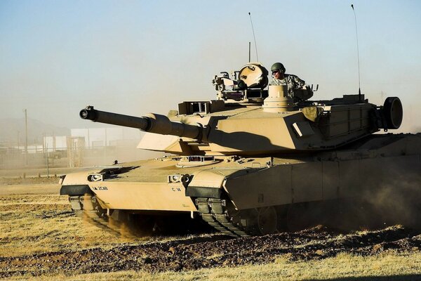 Tank in motion and firing weapons