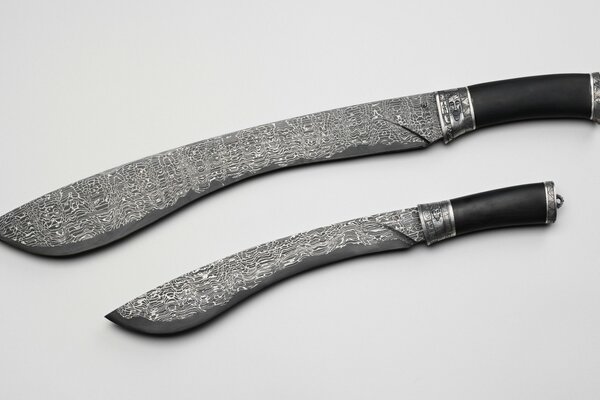 Photo of a machete knife with patterns on the blade