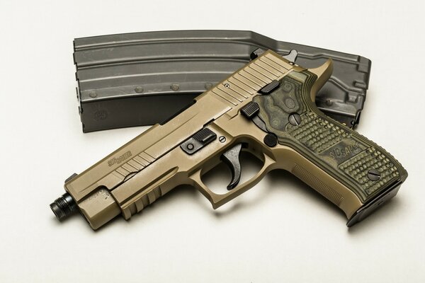 Sig-Sauer pistol in gold color