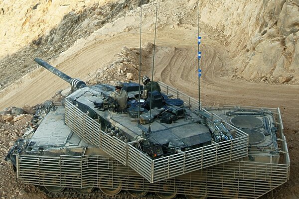 Tank on the sand in the mountains