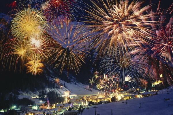 Night bright fireworks in the mountains