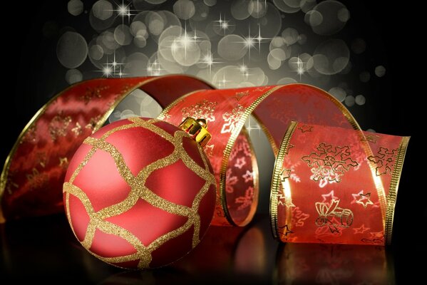 New Year s ball and ribbon in red
