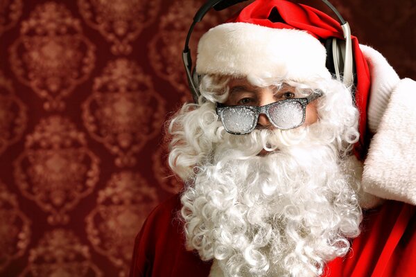 Santa Claus with a long beard and glasses