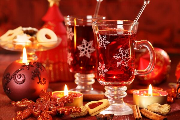 Tea among candles on the New Year s table