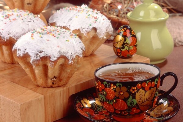 Easter holiday table with tea and cake