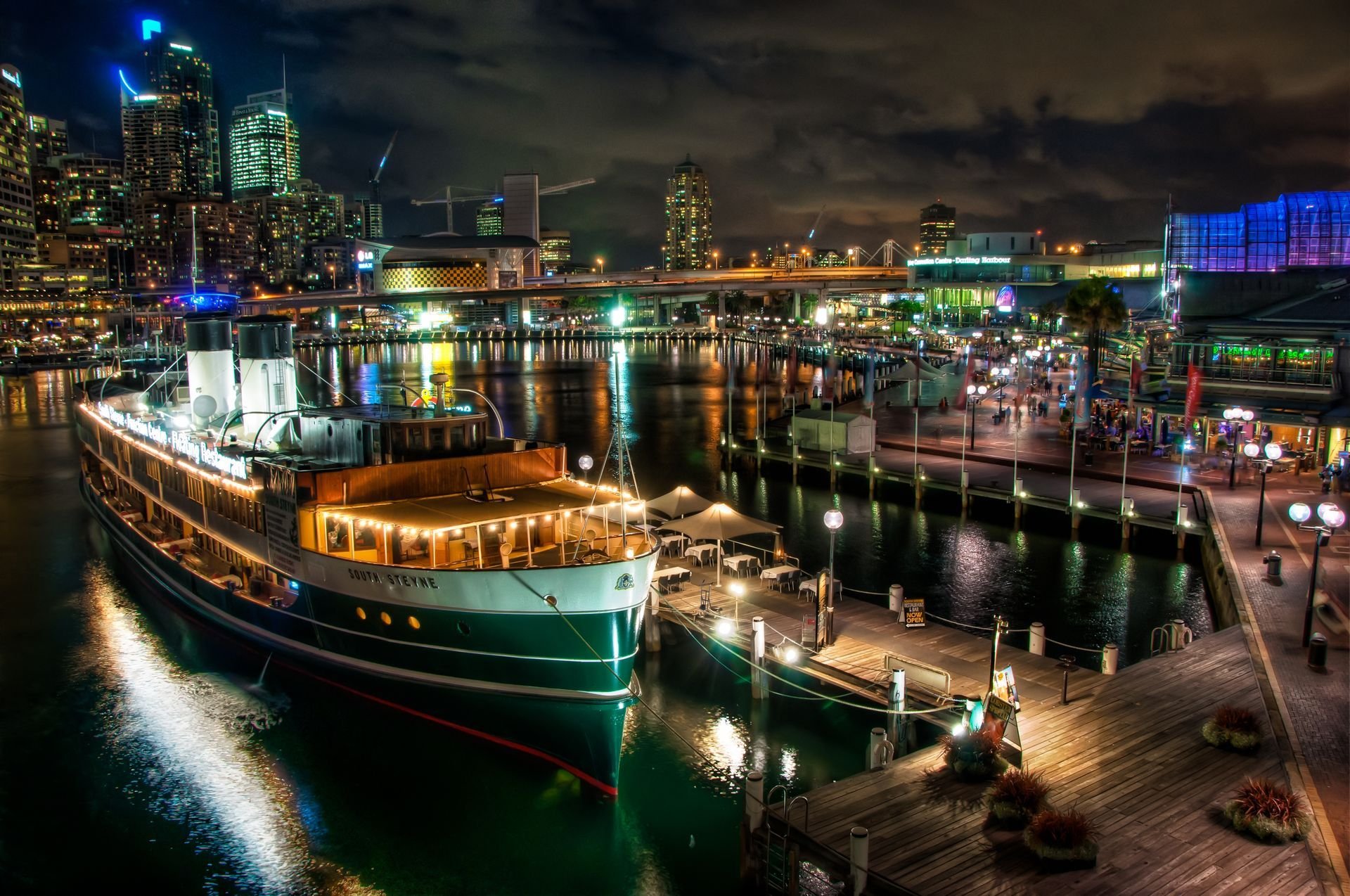 sydney australia barco barco de vapor muelle muelle ciudad luces puente edificios