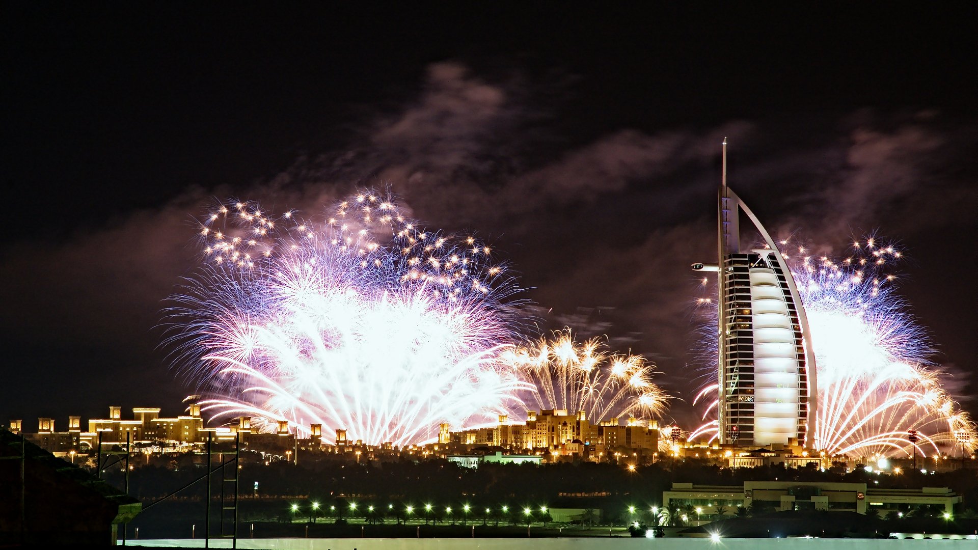 uae dubai city burj al arab hotel night lights firework