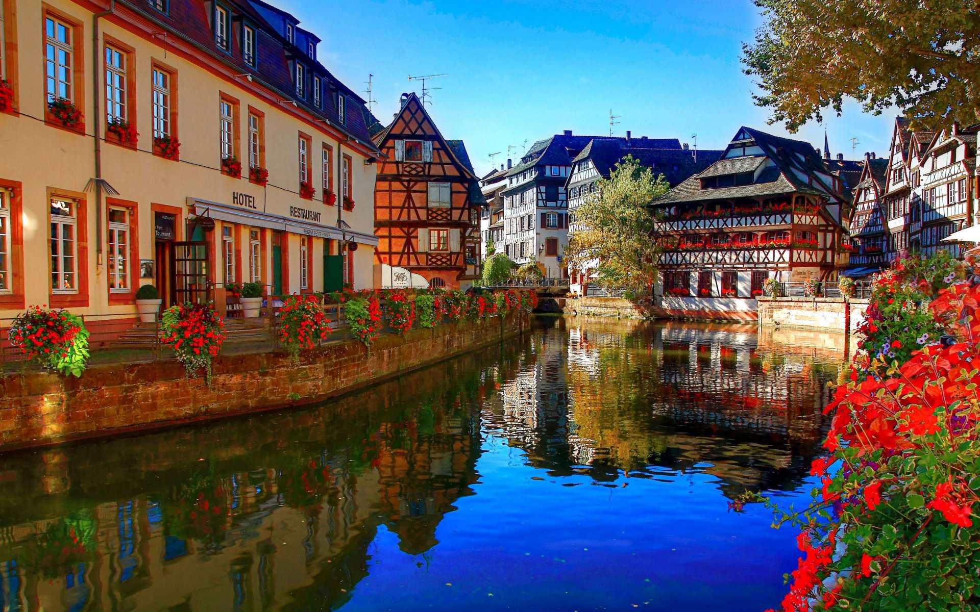 trasbourg france river channel architecture buildings house flower hotel restaurant