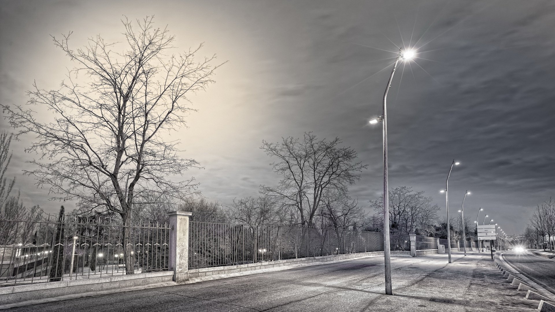 town street lamps fence night