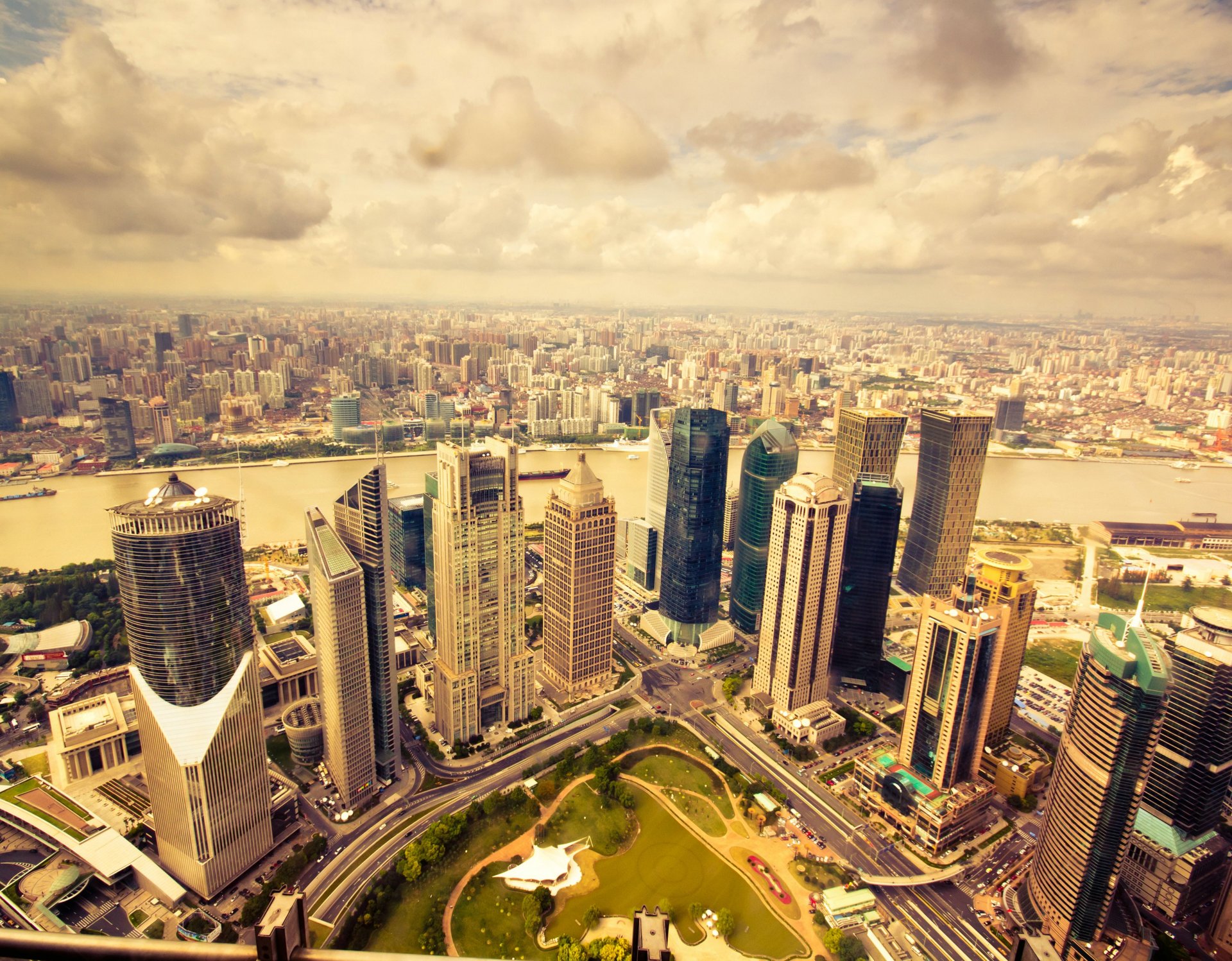 city view with a view skyscrapers metropolis photo view panorama buildings roads park clouds horizon