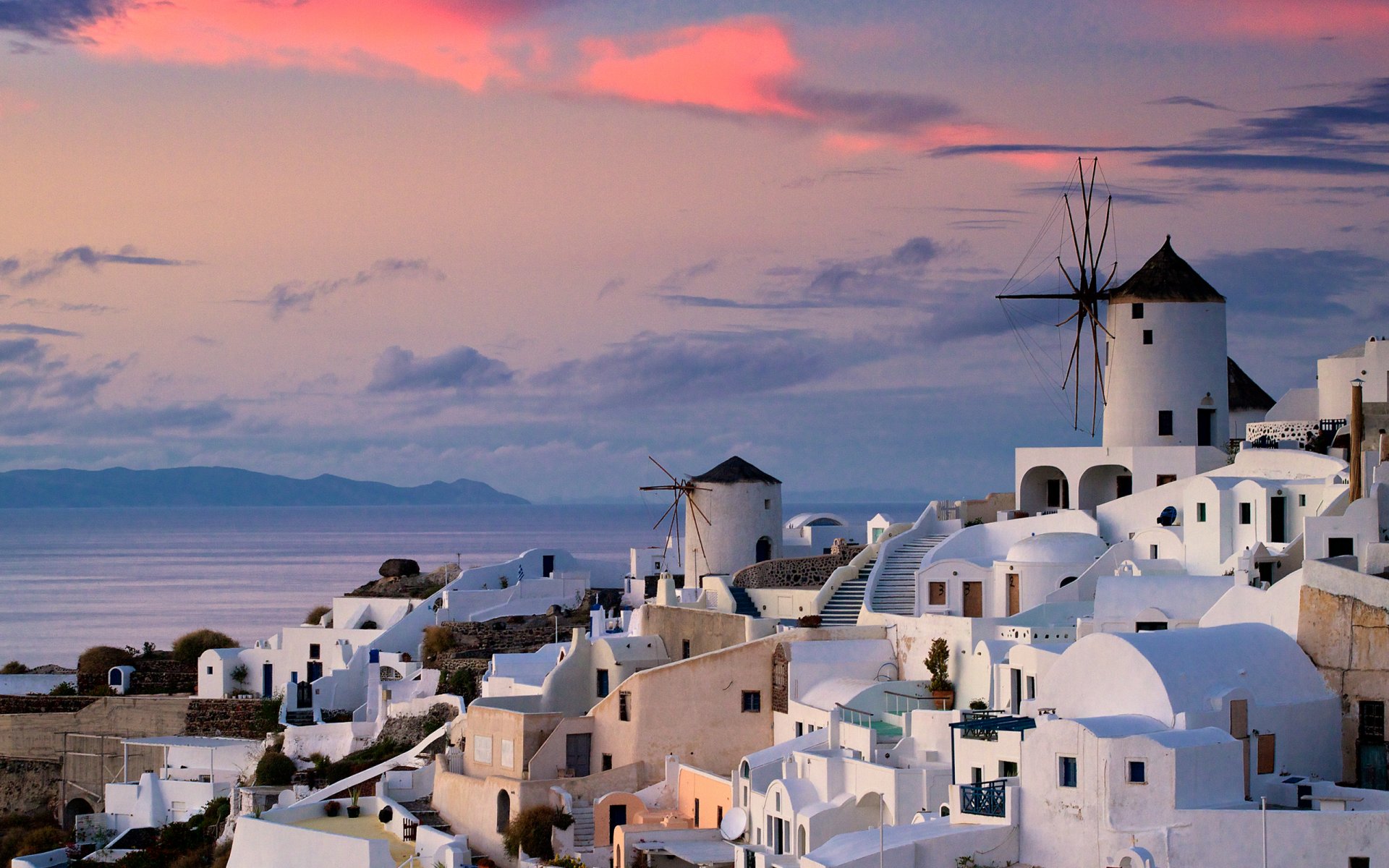 oia grecia città case tramonto oceano acqua cielo nuvole 2560x1600